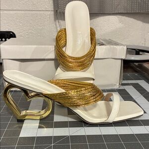 Slide on Gold Heart Heels